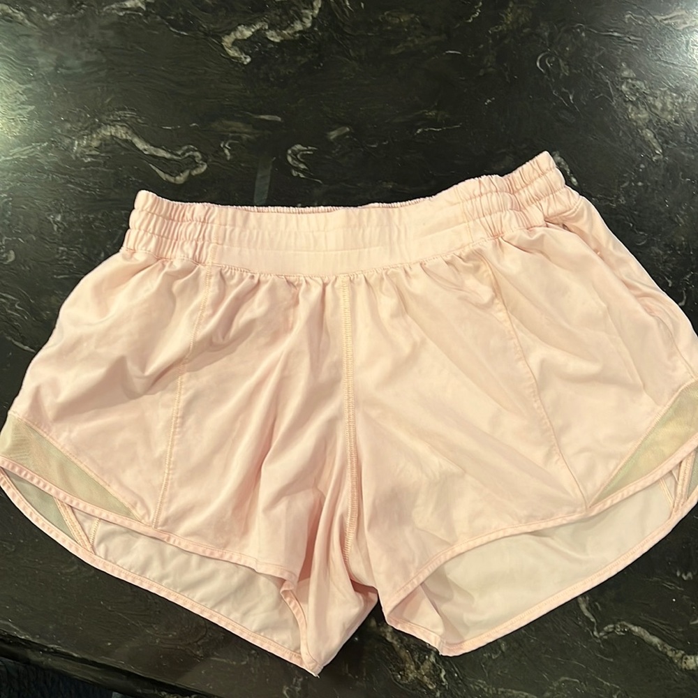 Lululemmon size 8 hotty  hot short with 4”length. Color is soft pink and rare.
